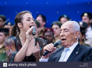israeli-president-shimon-peres-r-singing