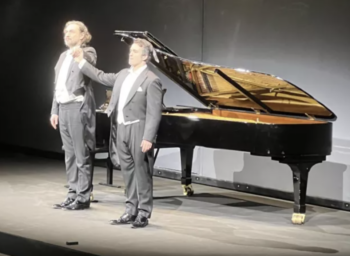 Xabier Anduaga y Maciej Pikulski saludos Real