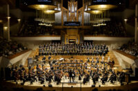 Dudamel y Nueva York: dos noches, cinco obras y una declaración de intenciones Ibermúsica. Temporada 2026-2027. Auditorio Nacional de Música, Madrid. New York Philharmonic. Director musical y artístico: Gustavo Dudamel. Martes, 13 de octubre de 2026. Di Castri: Invisible House (encargo de la Filarmónica de Nueva York; estreno en Madrid). J. Adams: On the Transmigration of Souls (estreno en Madrid). S. Prokófiev: Sinfonía núm. 5 en si bemol mayor, op. 100. Orfeó Català, Cor de Noies de l’Orfeó Català  y cantores del Cor Infantil de l’Orfeó Català. Miércoles, 14 de octubre de 2026. T. León: Imágenes mestizas (encargo de la Filarmónica de Nueva York; estreno en Madrid). G. Mahler: Sinfonía núm. 5 en do sostenido menor.